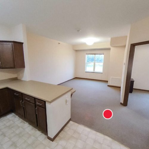 Open and accessible living space with natural light, ideal for comfortable retirement living.