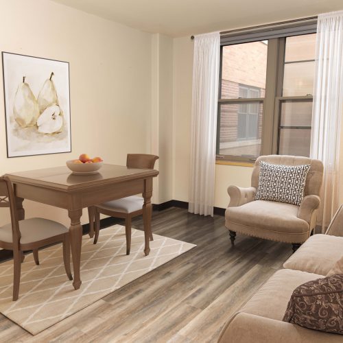 Bright and inviting living area with comfortable seating and a dining space for shared moments.