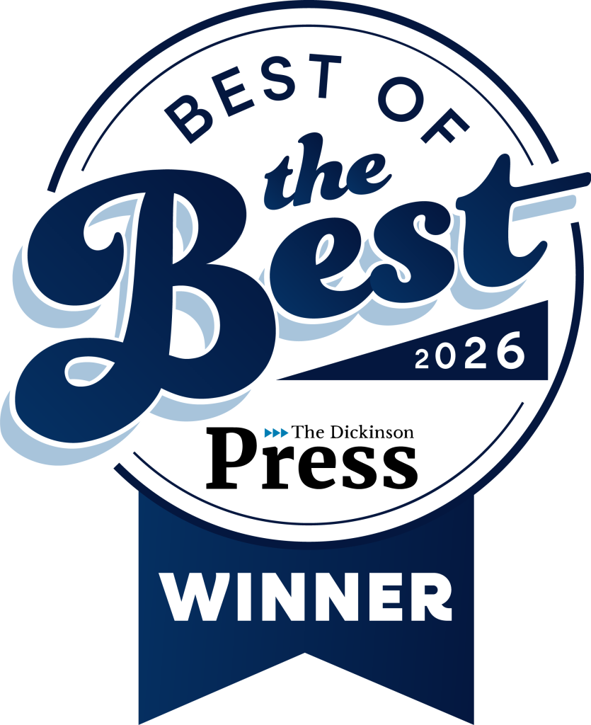 Award badge highlighting excellence and community trust for 2026 at The Dickinson Press.