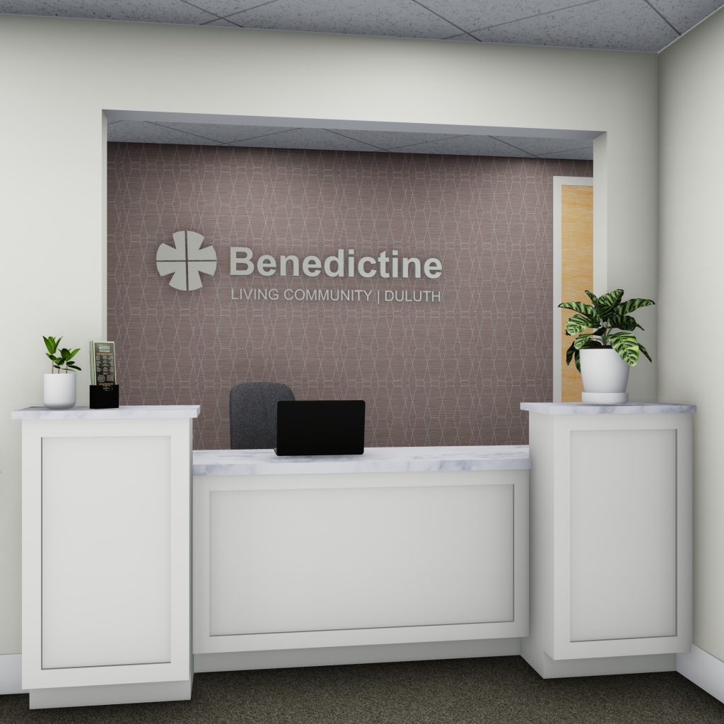 Welcoming reception area with clean design and greenery at Benedictine Living Community Duluth