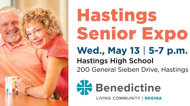 Two smiling seniors enjoy a warm moment together, highlighting friendly community living.