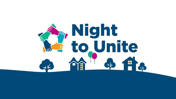 Colorful hands forming a star symbolizing unity above a friendly neighborhood scene with homes and trees.