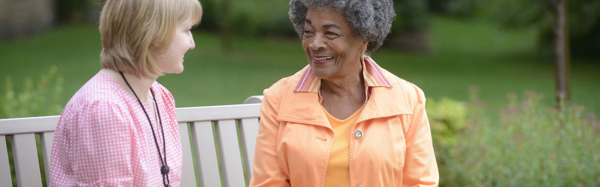 elderly woman outside smiling