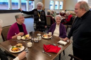 Archbishop Hebda chats with School Sisters of Notre Dame at Benedictine Shakopee